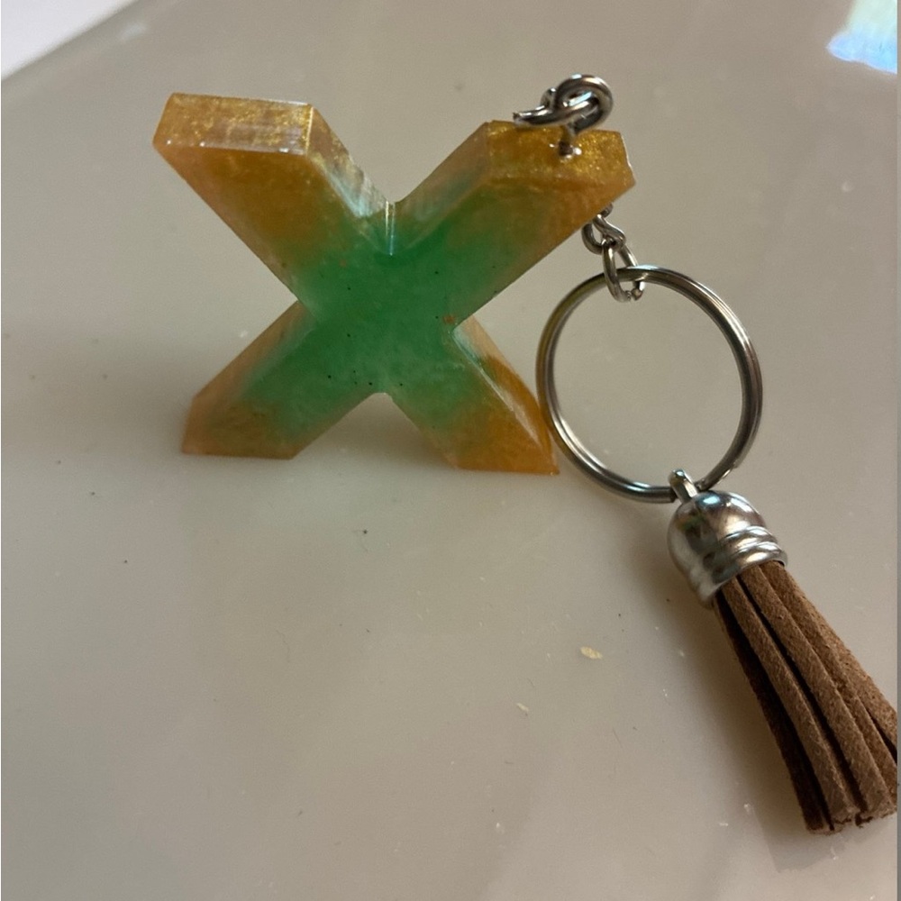 Green and yellow X Keyring with Tassel